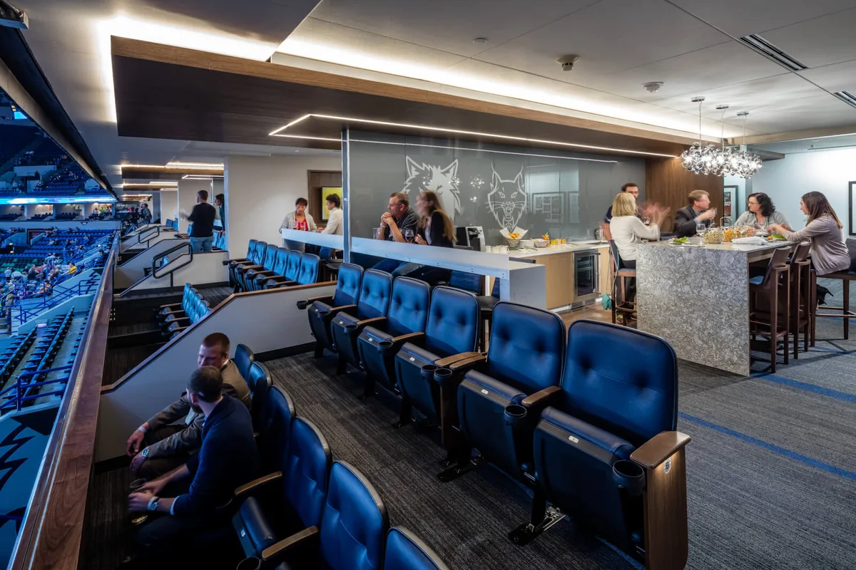 A VIP suite at Target Center overlooking the court.